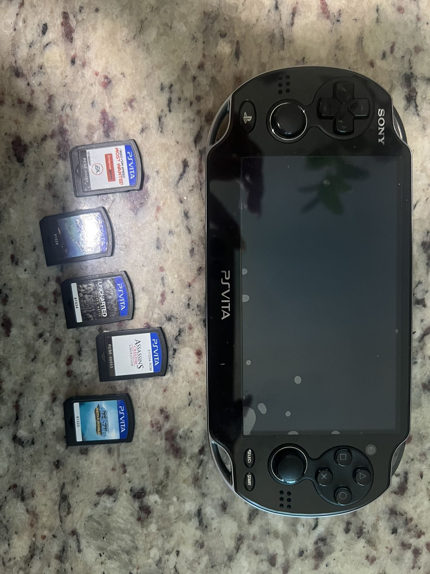 SONY PSVITA W CHARGER, 5 Games & Case 
