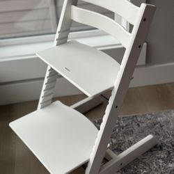 White Stokke Tripp Trap High Chair