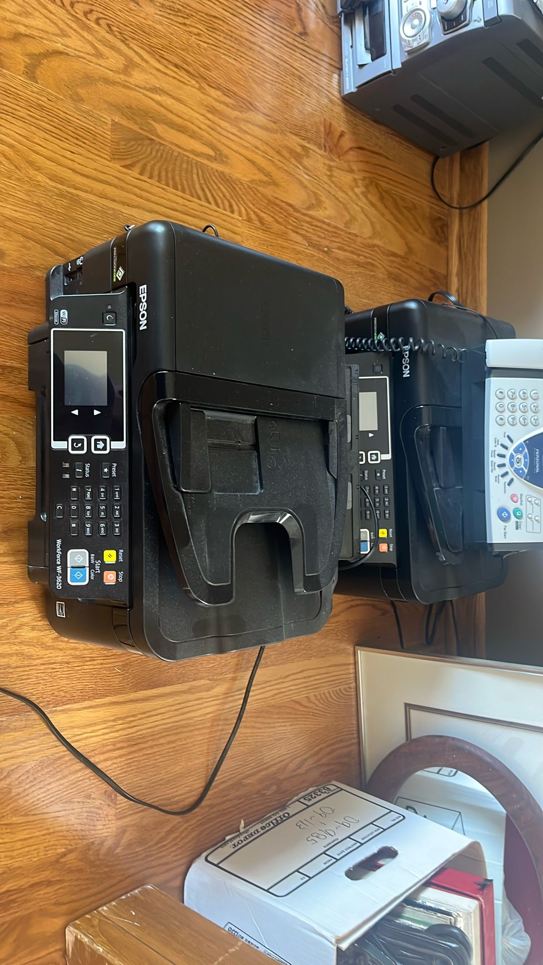 Two Epson Printers And A Fax Machine