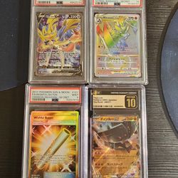 4 pokemon card slabs