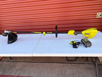 RYOBI 40V 15 in. Expand-It Cordless Battery Attachment Capable String Trimmer with 4.0 Ah Battery and Charger