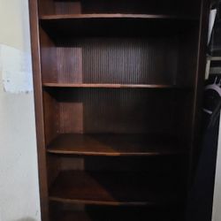 Tall Brown Wooden Shelf