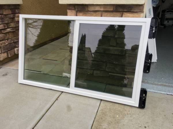 Brand New Simonton House replacement window / Slider / size w57-1/4 x h33-1/4