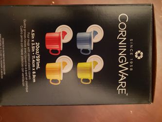 Four CorningWare 20 oz mugs w/ covers