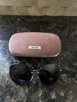 Miu Miu Glasses 