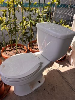 Free two toilets and sink