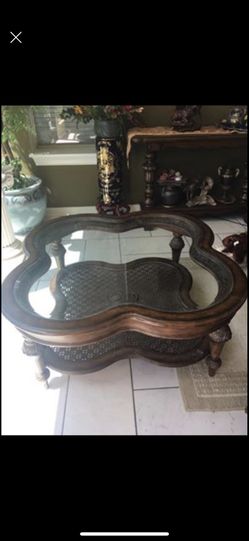Glass top wood coffee table