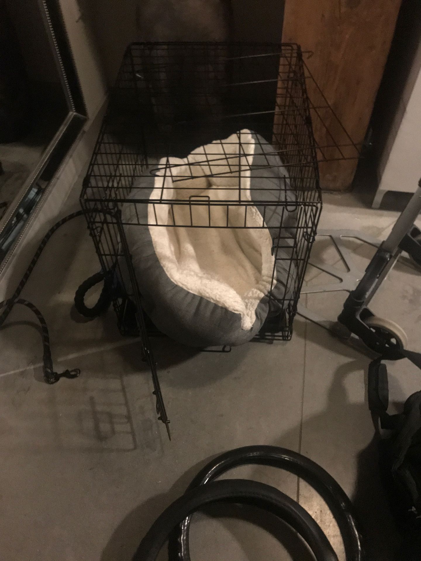 Dog cage with bed inside