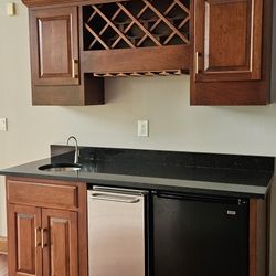 Bar cupboards, sink and countertop. Appliances NOT Included. 