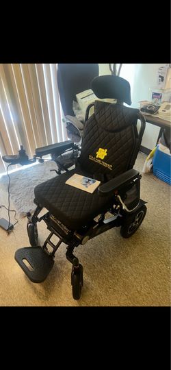 Remote control Wheel Chair with hand held remote
