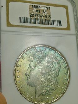Green Toner!! 1887 Morgan Silver Dollar NGC MS65