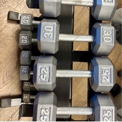 In NEW Condition Set Of Cast Iron Hex Dumbbells 5s, 12s, 20s 25s  And  30s. Total: 184 lbs [ RACK NOT INCLUDED]