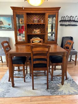 Dining table, six chairs and hutch