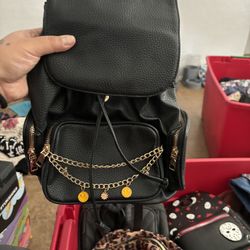 Black Backpack With Gold Chain