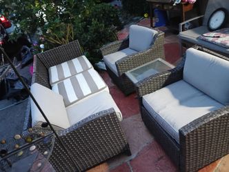 Harriet Sofa Set with Swivel Glider Chairs Features:

Furniture is crafted from woven high-density polyethylene (HDPE) wicker.
Cushions are upholstere