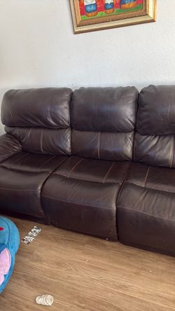Dark brown leather coach