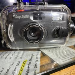 Brand new 35 mm camera in waterproof case to 100 feet depth