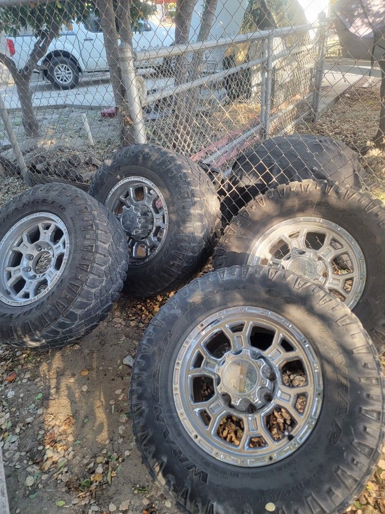 One Of The Tires And Rim Is Broken