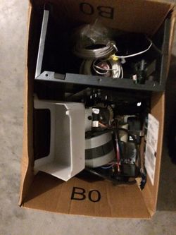 Garage door motor and parts. Chain/rail/openers