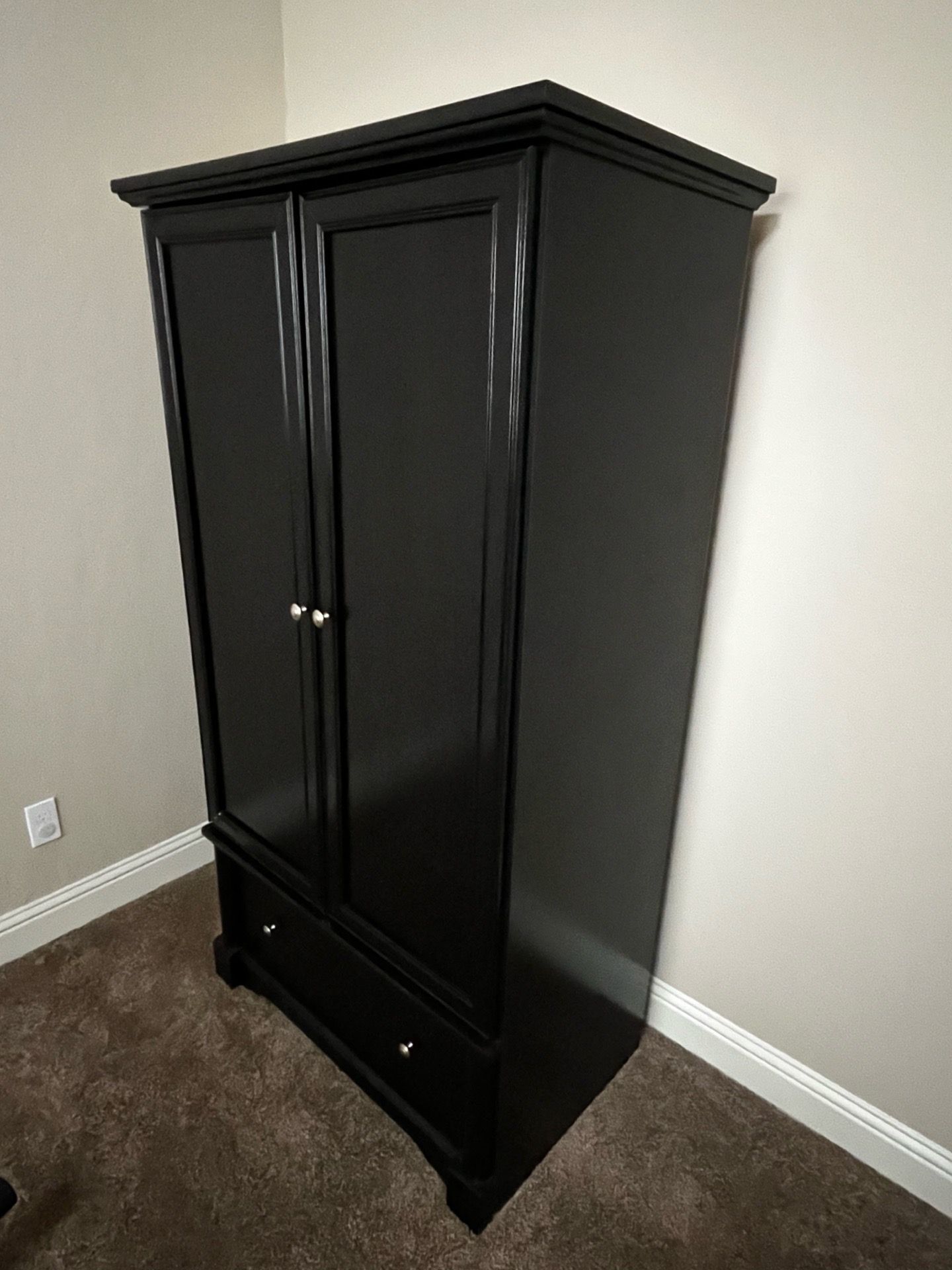 Black armoire