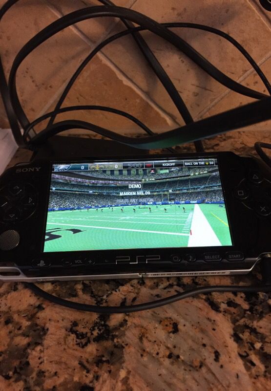 Psp portable PlayStation with madden game