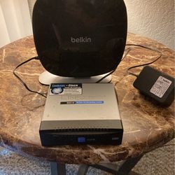 BELKIN WI FI ROUTER AND 16 PORT 