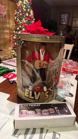 Elvis Still In A Box It’s Old And Five Candles Of Elvis One I Melted A Little Bit
