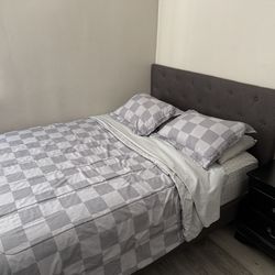 Queen size bed with nightstand