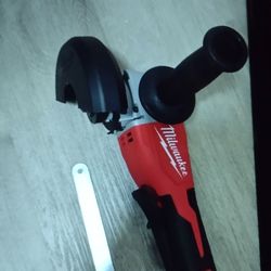 Milwaukee m18 brushless cordless 4-1/2' to 5' in. grinder with paddle Smith 18v tool only new 
