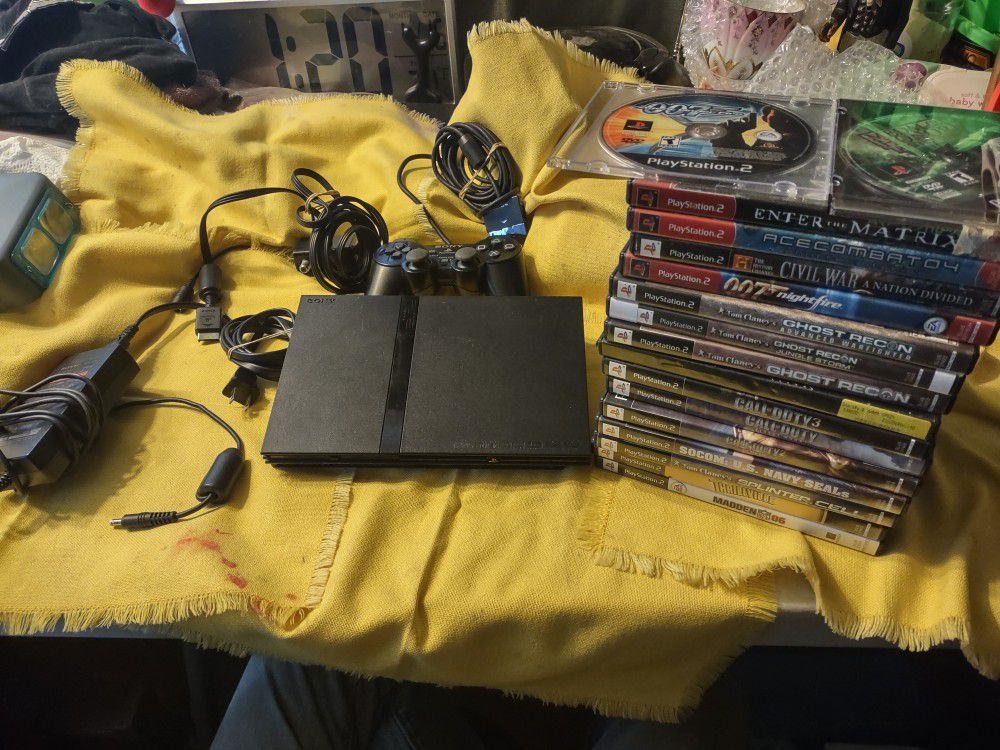 Slim PS2 With 17 Games Tested And Works Amazing Will Not Separate