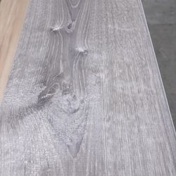 Sterling Oak 22 mil flooring.  20sqft per box of 7 pieces.  Brand new open box item.  Retail with tax $72 a box.  My price $49.