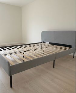 Gray Upholstered Bed Frame with Slatted Base