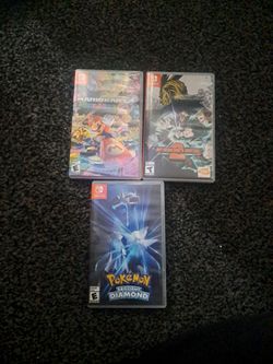 Nintendo switch games "Pokémon BD," " My Hero 1 justice," and " Mario kart 8 Deluxe"