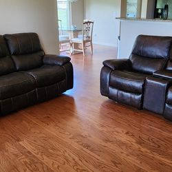 Powered Reclining Leather Couch And Loveseat (Delivery Available 