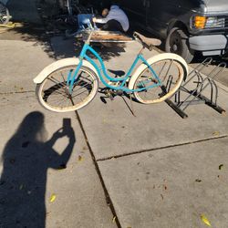 vintage Schwinn Hollywood ladies beach cruiser bicycle in a light blue or turquoise color. 