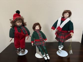 Set Of 3 Christmas Porcelain Ice Skating Dolls