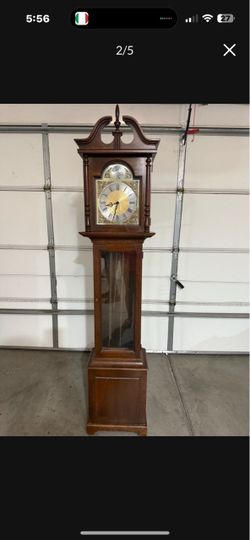 Grandfather clock Wide: 16” inches Deep: The 10” High: 72”inches In very good condition some scratches here and there