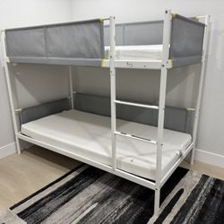 Bunk bed with mattresses
