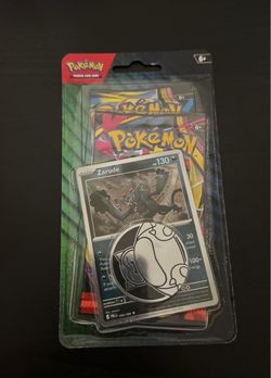 Pokémon TCG Sealed Blister Pack – Zarude Promo, Coin & 2 Booster Packs