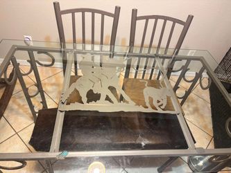 Dining room table with Metal Cowboy Roper
