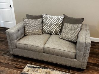 Gray Fabric Loveseat with Nailhead Trim