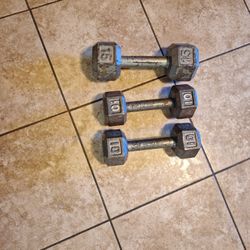 2 10 LB POUND  DUMBBELLS  AND ONE 15 LB  POUND  DUMBBELLS. ALL 3 FOR  $50. FIRM PRICE 