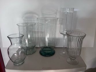 Five Glass vases small and large