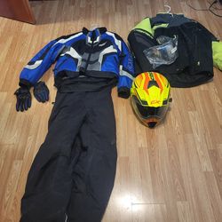 2 snow mobiles jackets,overalls gloves and helmet