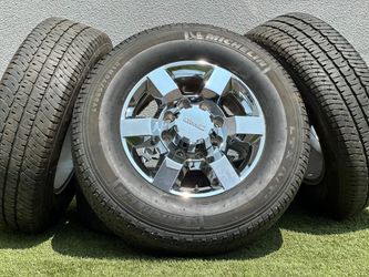 Chrome 18” GMC Sierra 3500 rims Sierra 2500 wheels A/T tires 8x180 Chevy Silverado High Country LTZ 