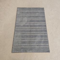 Two brand new area rugs