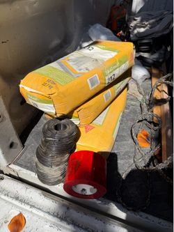 NEW Rolls of Wire /Silka Leveling cement Bags /red tape