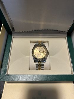 250$ Gold White Rolex
