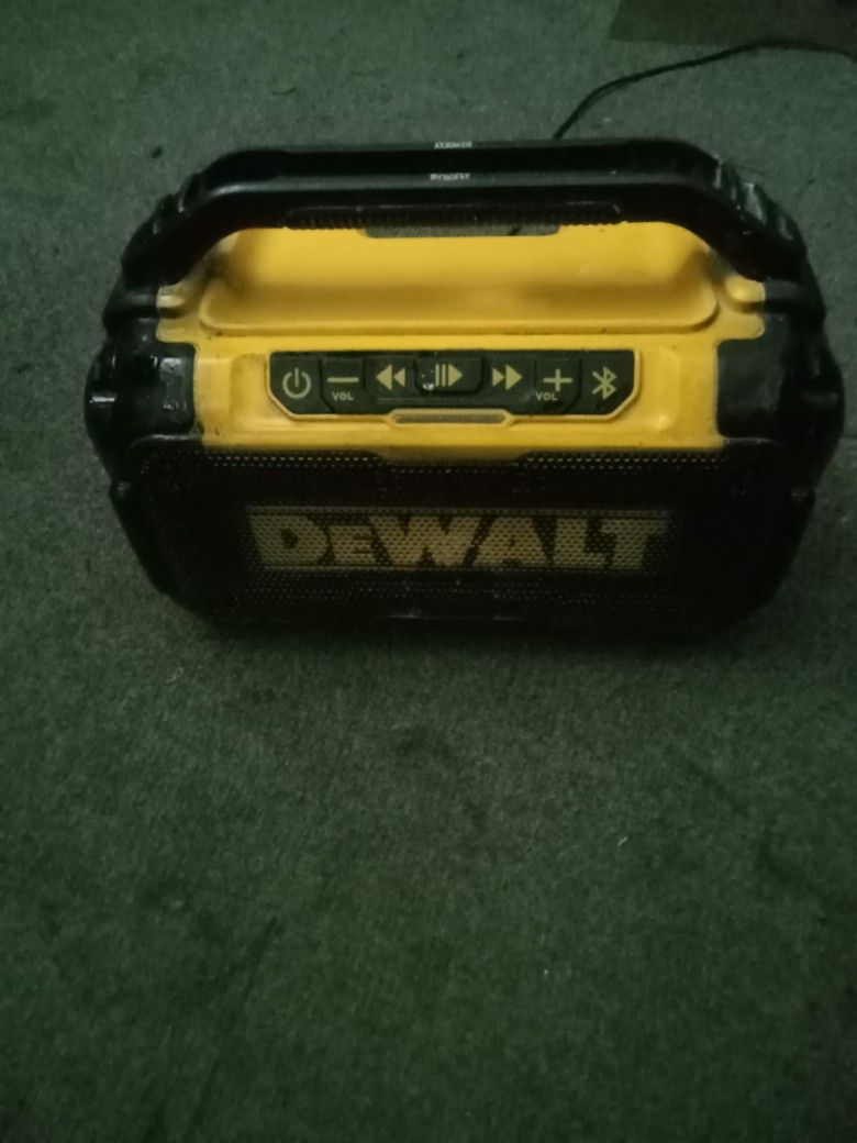 Dewalt Bluetooth speaker sound clear and has good bass uses plug or battery 50 $