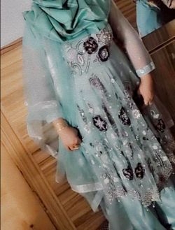 Light blue formal party dress with matching jewelry set. Worn only 1–2 times and in excellent condition. Beautiful embroidery, beadwork, and sequins. 